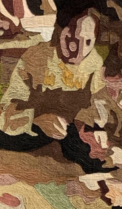 Yksityiskohta tilkkupeitosta, joka on kuin maalaus.